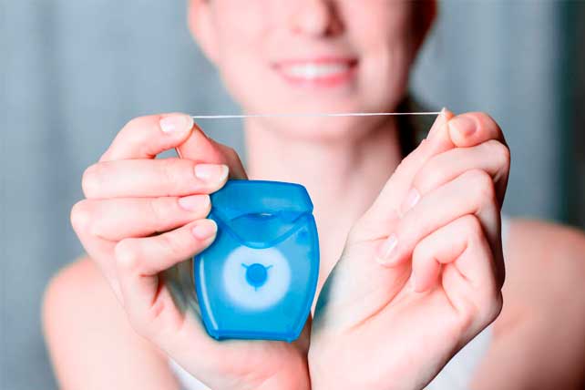 hilo dental separa los dientes